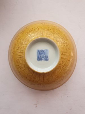 Lot 966 - A CHINESE YELLOW-GLAZED 'DRAGON' BOWL.