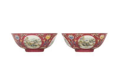 Lot 1034 - A PAIR OF CHINESE FAMILLE ROSE RUBY-GROUND 'MEDALLIONS' BOWLS.