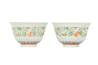 Lot 424 - A PAIR OF CHINESE FAMILLE ROSE 'BATS AND GOURDS' CUPS.