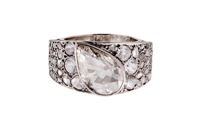 Lot 59 - A pear-shaped diamond dress ring