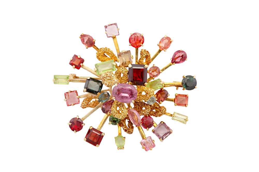 Lot 122 - A multi-gem sunburst brooch