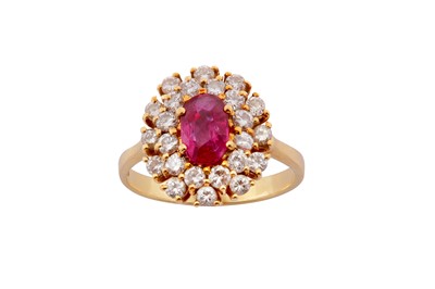 Lot 63 - A ruby and diamond cluster ring