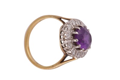 Lot 49 - AN AMETHYST AND DIAMOND CLUSTER RING