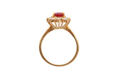 Lot 62 - A ruby and diamond cluster ring