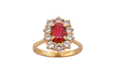 Lot 62 - A ruby and diamond cluster ring