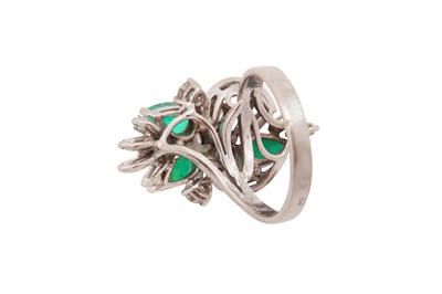 Lot 108 - An emerald and diamond dress ring