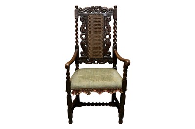 Lot 236 - A CAROLEAN STYLE CARVED OPEN ARMCHAIR