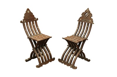 Lot 650 - λ A NEAR PAIR OF MOTHER-OF-PEARL-INLAID HARDWOOD FOLDABLE CHAIRS