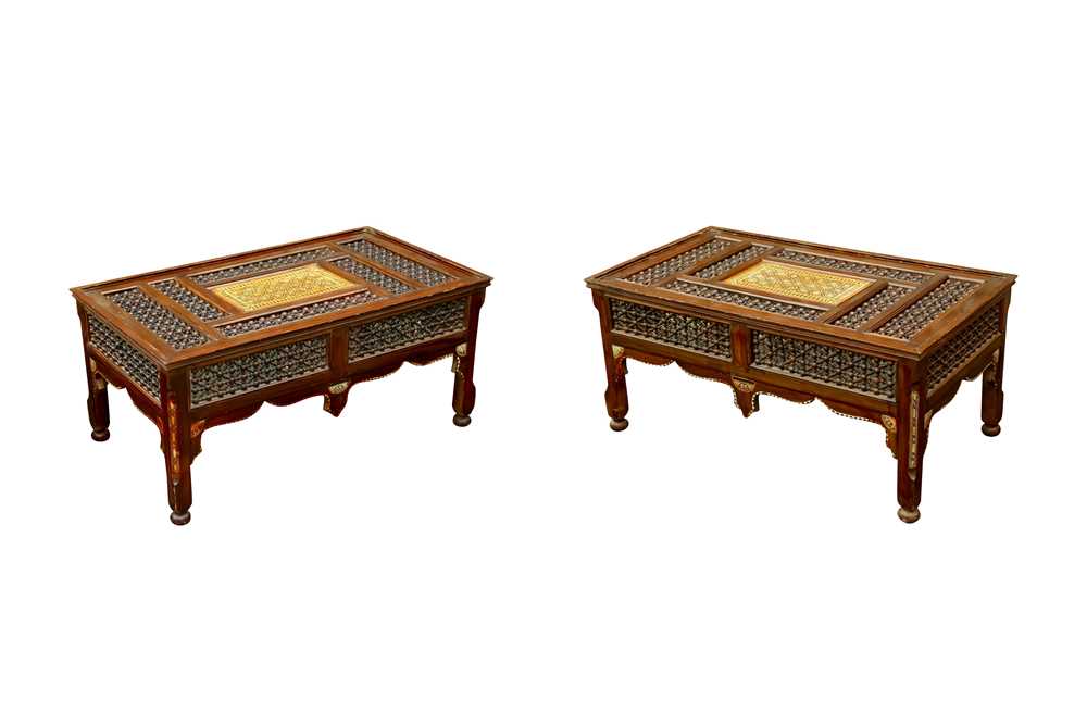 Lot 638 - λ A PAIR OF MOTHER-OF-PEARL AND BONE-INLAID ORIENTALIST MASHRABIYA-STYLE LOW TABLES
