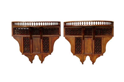 Lot 709 - A PAIR OF ORIENTALIST MASHRABIYA-STYLE HARDWOOD WALL SHELVES AND A SMALL OCCASIONAL LOW TABLE