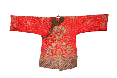 Lot 378 - A CHINESE RED-GROUND EMBROIDERED SILK 'DRAGON AND PHOENIX' JACKET.