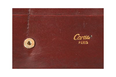 Lot 51 - Cartier Burgundy Must De Cartier Long Wallet and Coin Purse