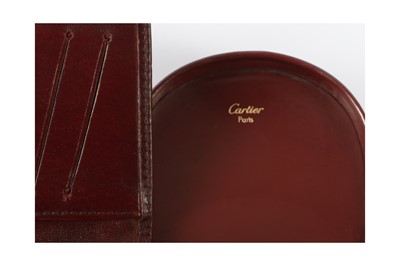 Lot 51 - Cartier Burgundy Must De Cartier Long Wallet and Coin Purse
