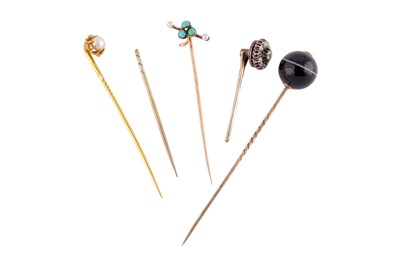 Lot 57 - A GROUP OF FIVE STICK PINS