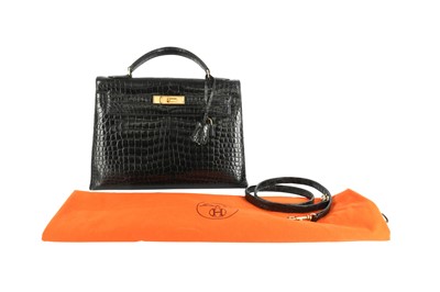 Lot 420 - λ Hermes Black Shiny Crocodile Kelly Sellier 32