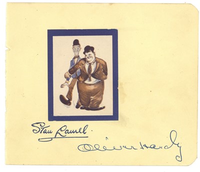 Lot 910 - Laurel (Stan) & Oliver Hardy