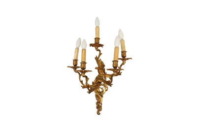 Lot 664 - A FRENCH GILT BRONZE THREE LIGHT WALL APPLIQUE, IN THE LOUIS XV STYLE, 20TH CENTURY