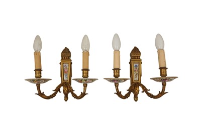 Lot 655 - A PAIR OF SEVRES STYLE PORCELAIN AND BRASS MOUNTED TWO ARM WALL LIGHTS, 20TH CENTURY