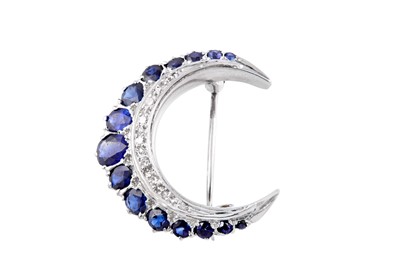 Lot 35 - A sapphire and diamond moon crescent brooch