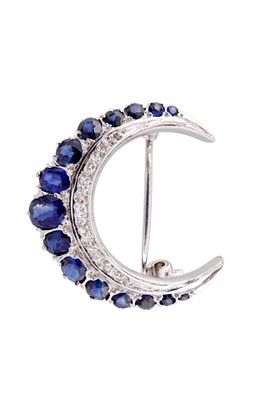 Lot 35 - A sapphire and diamond moon crescent brooch
