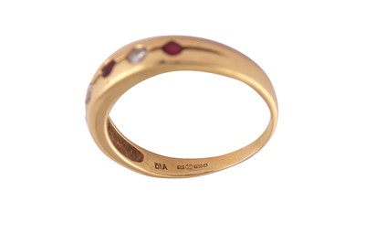 Lot 13 - A FIVE STONE RUBY AND DIAMOND RING