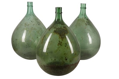 Lot 862 - THREE VETRERIA RIGATTI GREEN GLASS BOTTLES, 20TH CENTURY