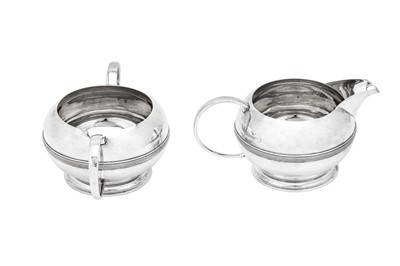 Lot 362 - A George VI sterling silver three-piece tea service, Birmingham 1948 by Albert Henry Jephcott and Albert Henry Jephcott Junior (first reg. 8th March 1920, this mark 15th March 1932)