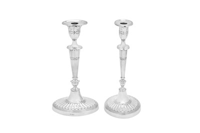 Lot 357 - A pair of Elizabeth II sterling silver candlesticks, Sheffield 1962 by James Dixon and Sons