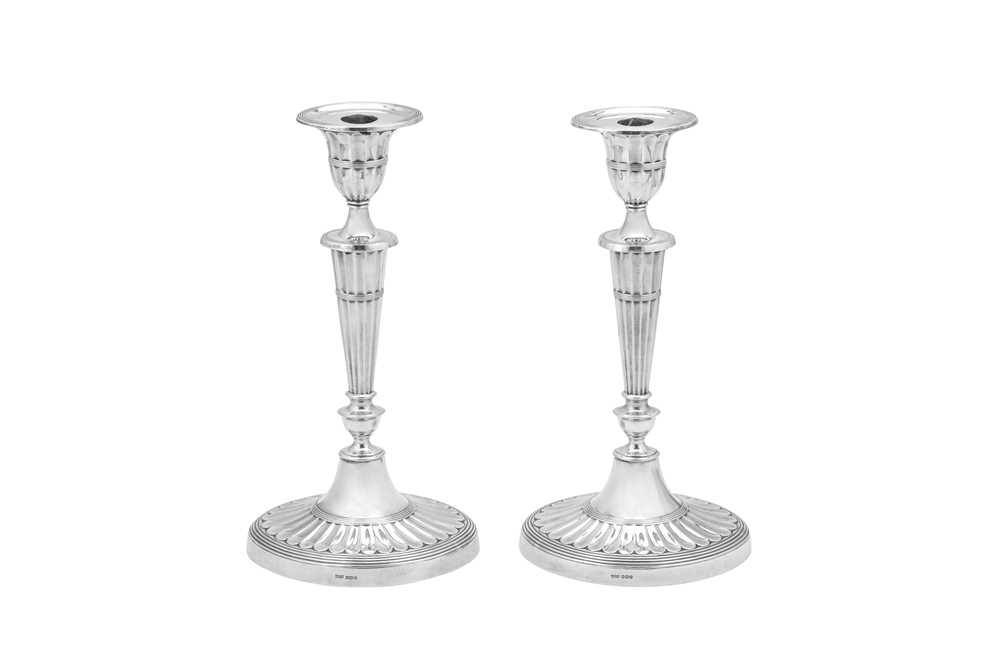 Lot 357 - A pair of Elizabeth II sterling silver candlesticks, Sheffield 1962 by James Dixon and Sons