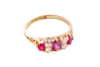 Lot 108 - A RUBY AND DIAMOND RING