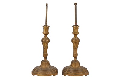 Lot 195 - A PAIR OF LOUIS XVI STYLE BARBEDIENNE GILT BRONZE CANDLESTICKS, 19TH CENTURY