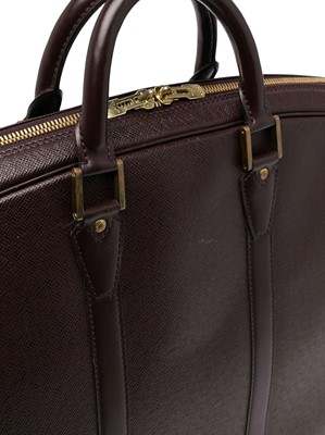 Lot 70 - Louis Vuitton Burgundy Taiga Helanga Travel Bag