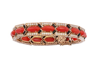 Lot 144 - λ A coral, diamond and onyx line bracelet