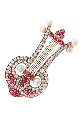 Lot 61 - A diamond and ruby brooch