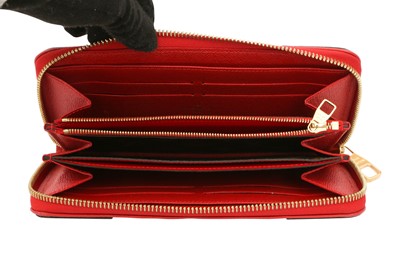 Lot 197 - Louis Vuitton Monogram Retiro Zippy Wallet