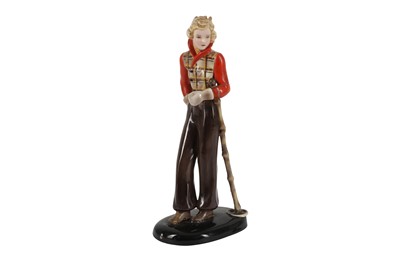 Lot 29 - A GOLDSCHEIDER FIGURE OF A YOUNG WOMAN IN A SKIING OUTFIT