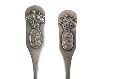 Lot 290 - A SET OF TWELVE EARLY TO MID 19TH CENTURY GERMAN 12 LOTH (750 STANDARD) SILVER TABLESPOONS