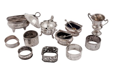 Lot 285 - A MIXED GROUP OF STERLING SILVER CRUETS AND NAPKIN RINGS