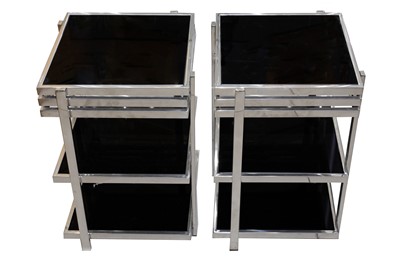 Lot 910 - EICHHOLTZ, A PAIR OF CHROME THREE TIER BEDSIDE TABLES, CONTEMPORARY