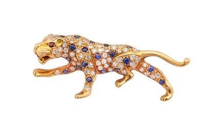 Lot 26 - A sapphire, ruby and diamond panther brooch