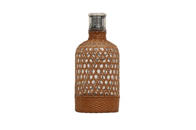 Lot 496 - A RAFFIA COVERED GLASS BOTTLE, 20TH CENTURY