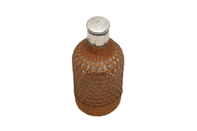 Lot 496 - A RAFFIA COVERED GLASS BOTTLE, 20TH CENTURY