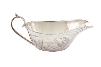 Lot 338 - A GEORGE V STERLING SILVER SAUCE BOAT, SHEFFIELD 1933 BY AW JH (UNTRACED)