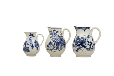 Lot 422 - THREE WORCESTER BLUE AND WHITE PORCELAIN JUGS, 18TH CENTURY
