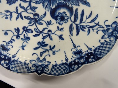 Lot 424 - TWO WORCESTER BLUE AND WHITE PORCELAIN PLATES, 18TH CENTURY