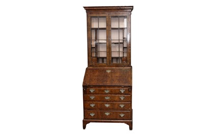 Lot 100 - A GEORGE II AND LATER FIGURED WALNUT BUREAU BOOKCASE OF NARROW PROPORTIONS