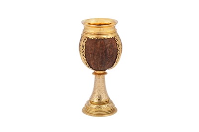 Lot 475 - A George V sterling silver gilt coconut cup, London 1928 by Carrington and Co
