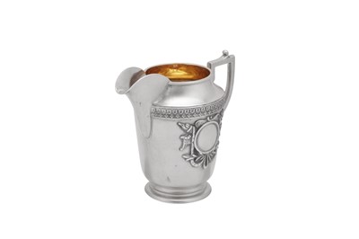 Lot 23 - A Nicholas II early 20th century Russian (Polish) 84 zolotnik silver milk jug