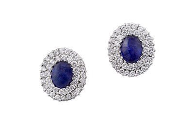 Lot 32 - A pair of sapphire and diamond cluster earstuds