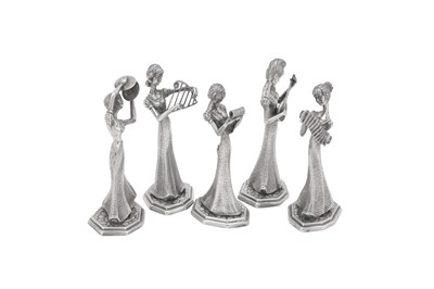 Lot 355 - Five late 20th century sterling silver musical figures, import marks for London 1973 by Mappin and Webb